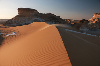 Scenic view of desert against sky