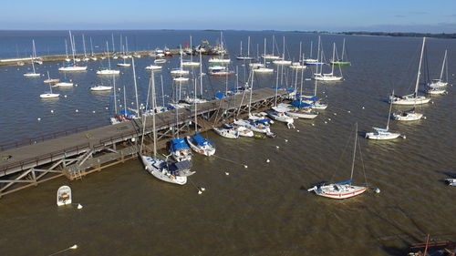 High angle view of boats moored at harbor