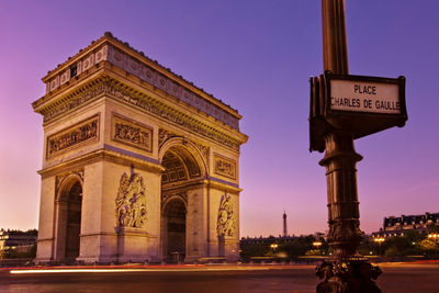 Historic gate on road in city