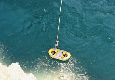 High angle view of man in boat on sea