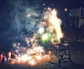 Firework display at night