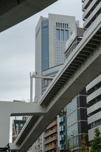 Low angle view of modern buildings against sky