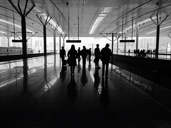 Group of people walking in building