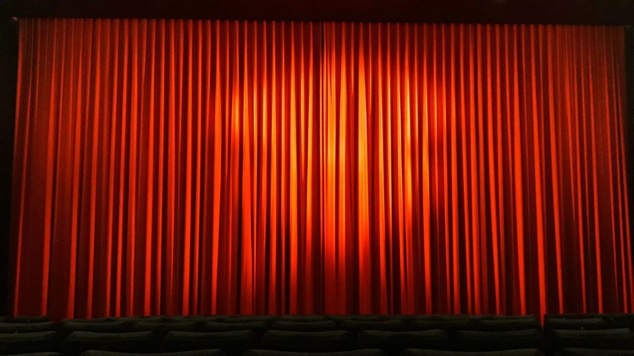 stage, stage - performance space, curtain, arts culture and entertainment, red, stage theater, performance, movie theater, indoors, film industry, performing arts event, textile, no people, theatrical performance, illuminated, backgrounds, absence, spotlight, closed, movie, nightlife