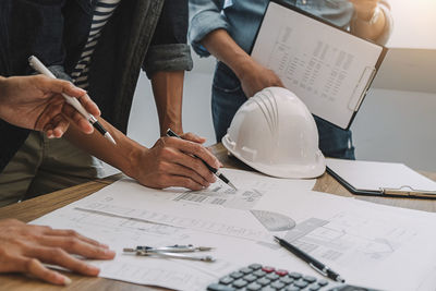 Group of people working on table