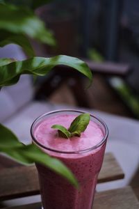 Close-up of smoothie served on table