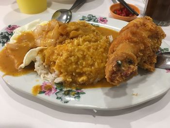 Close-up of served food in plate