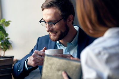 Portrait of man drinking coffee