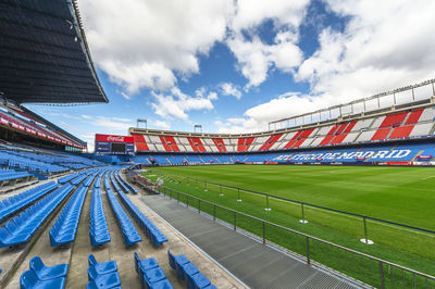 Low angle view of soccer field against sky