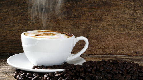 Close-up of coffee cup on table