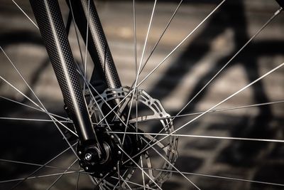 Close-up of bicycle on rope