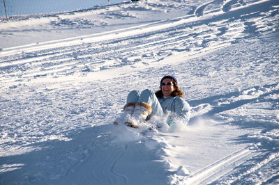 Full length of man on snow covered mountain