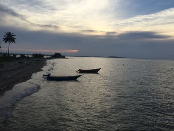 Scenic view of sea against sky at sunset