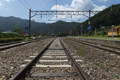 Railway tracks against sky