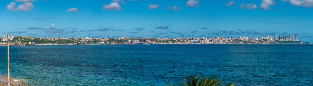 Scenic view of sea against blue sky