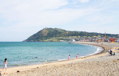 People enjoying at beach