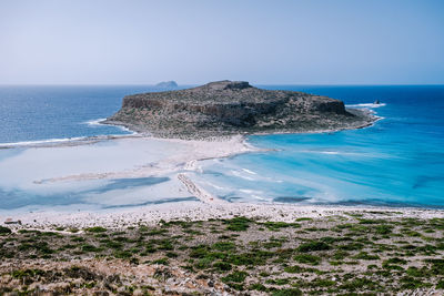 Scenic view of sea against clear sky