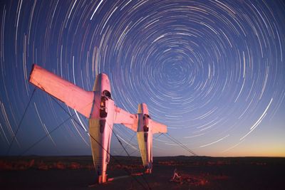 Full length of woman against clear sky at night