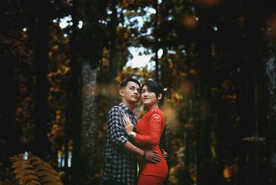 Young couple kissing outdoors