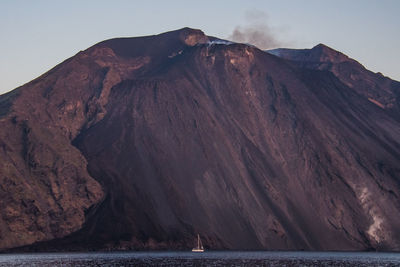 Scenic view of volcanic mountain against sky