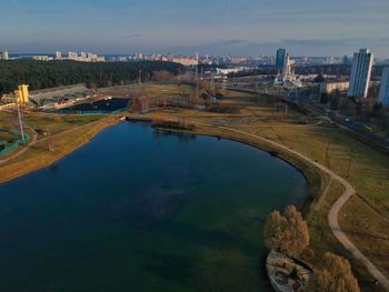 High angle view of river passing through city