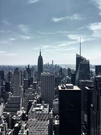 Cityscape against sky at dusk