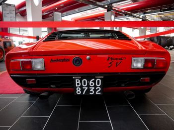 Close-up of red vintage car