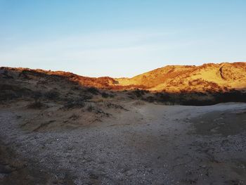 Scenic view of desert against sky