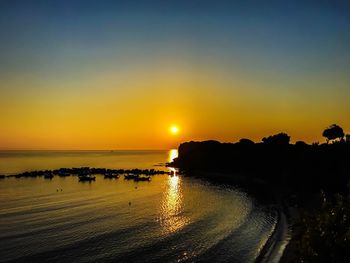 Scenic view of beach during sunset