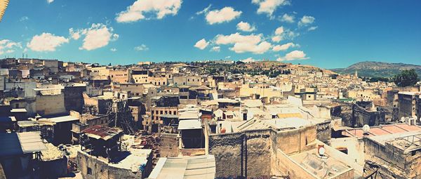 Cityscape against blue sky