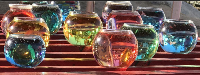 Close-up of wine glasses on table