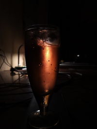 Close-up of beer glass on table