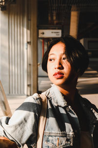 Portrait of mid adult man looking away