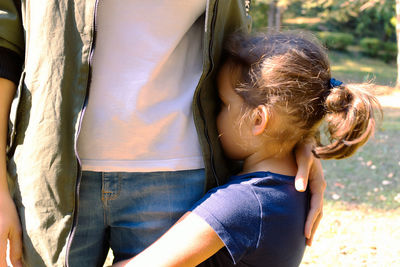 Midsection of woman in playground