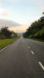 Empty road at sunset
