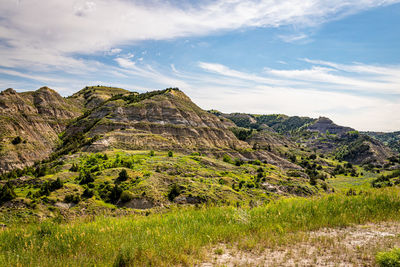 Scenic view of rocky mountains against sky