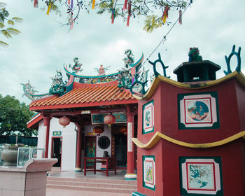 Low angle view of temple against sky