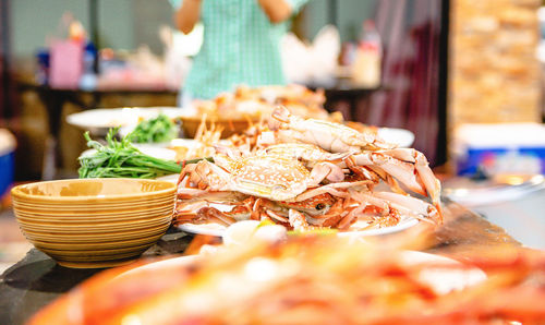 Seafood crab of restaurant with other dishes in the background