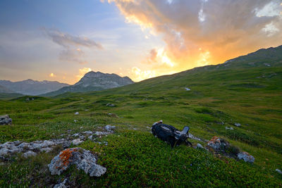 Scenic view of mountains against sky during sunset