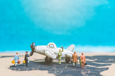 Close-up of toys on sea shore