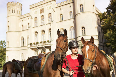 Young woman with horses