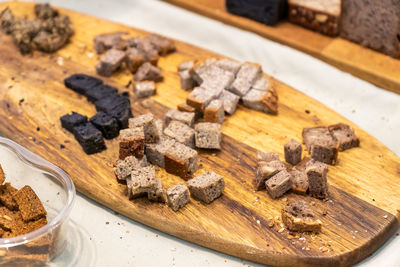 Close-up of a promotion desk with organic gluten free vegan bread on a wooden desk