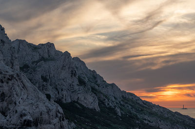 Scenic view of mountains against sky during sunset