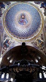 Low angle view of ornate ceiling of building