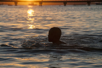 Portrait of man swimming in sea