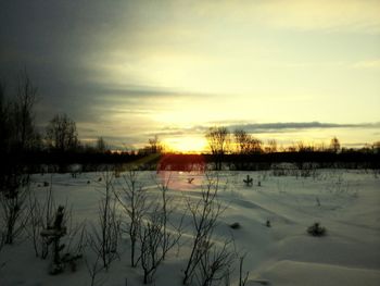 Scenic view of snow covered landscape against sky