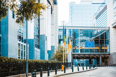 Buildings in city against sky