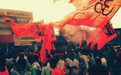 Crowd of traditional flags against sky