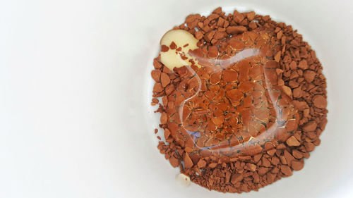 High angle view of ice cream over white background