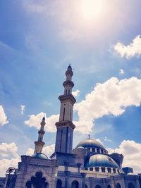 Low angle view of statue against cloudy sky